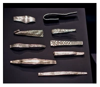 Several silver arm rings